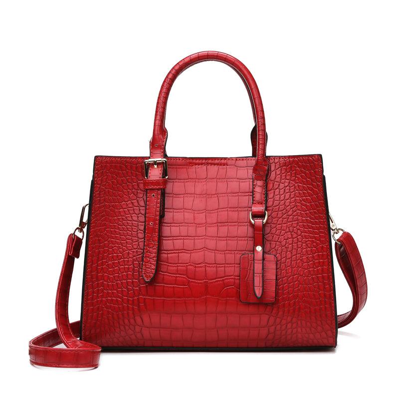 Bolsa de Couro com Estampa de Cobra. - Lindas & Cia Shop