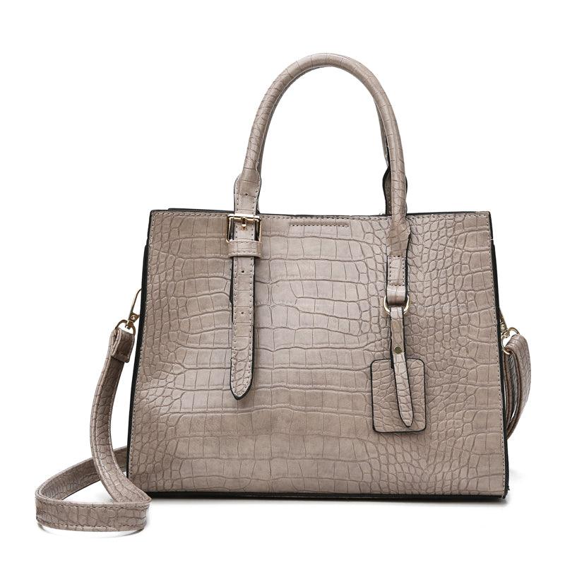 Bolsa de Couro com Estampa de Cobra. - Lindas & Cia Shop