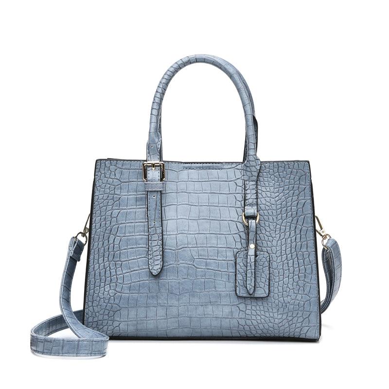 Bolsa de Couro com Estampa de Cobra. - Lindas & Cia Shop