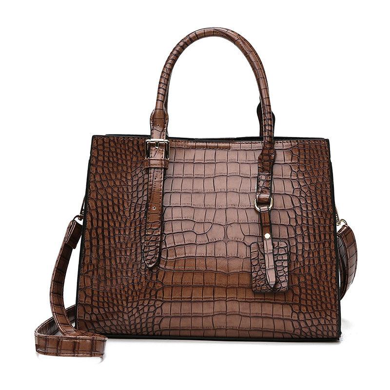 Bolsa de Couro com Estampa de Cobra. - Lindas & Cia Shop