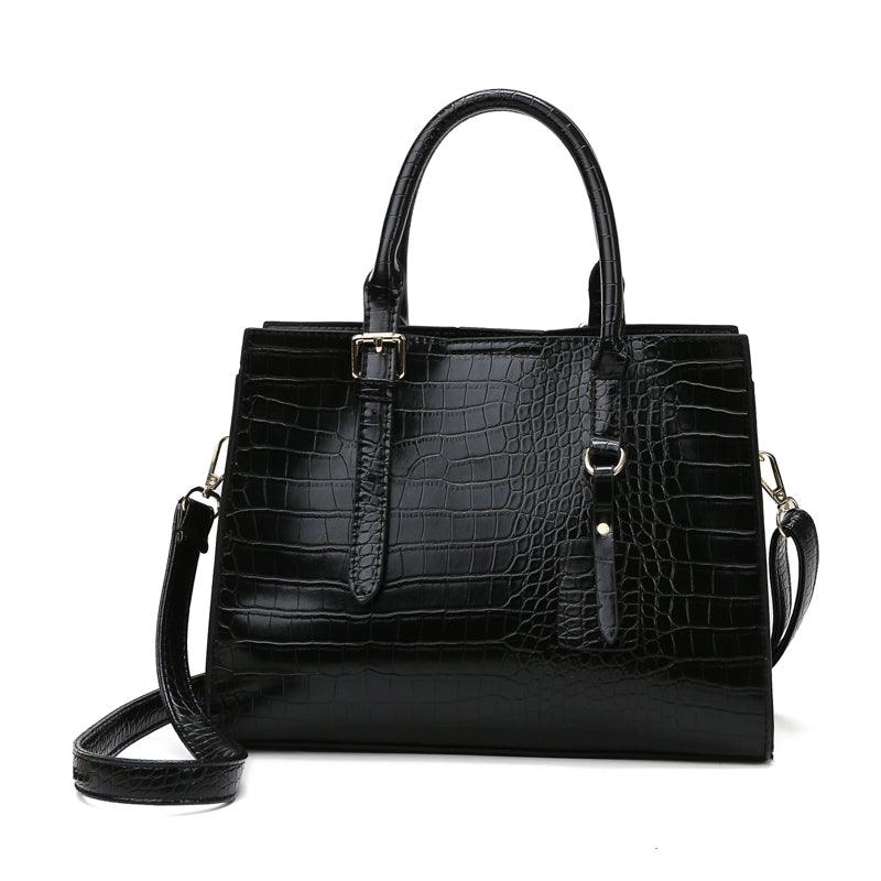 Bolsa de Couro com Estampa de Cobra. - Lindas & Cia Shop