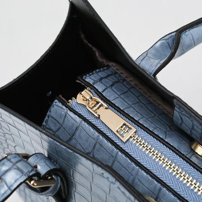 Bolsa de Couro com Estampa de Cobra. - Lindas & Cia Shop